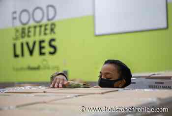 Houston Food Bank, the nation's largest, seeks to fill volunteer gaps with National Guard leaving - Houston Chronicle