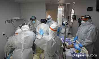 Window into virus surge: Death, recovery at Houston hospital - The Associated Press