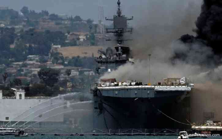 Firefighters battle massive blaze on US navy ship after explosion in San Diego