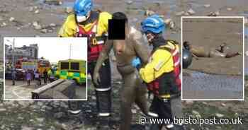 Mud-covered man helped ashore in major emergency operation