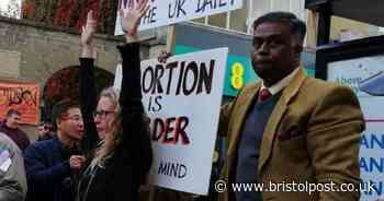 Preacher with 'abortion is murder' signs says he's being denied free speech