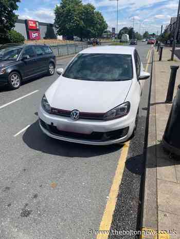 Car seized after man accused of driving while on his phone
