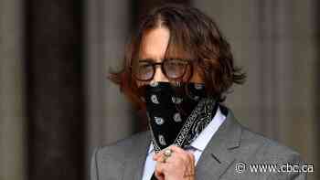 Johnny Depp tells libel trial Amber Heard hit him with wild 'haymaker' punch