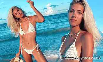 Model Devon Windsor wears tiny white bikini on Bahama beach