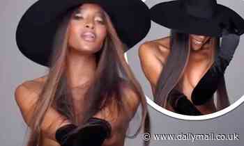 Naomi Campbell wears nothing but hat and gloves for mascara ad