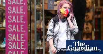 What are the rules over face masks in English shops?