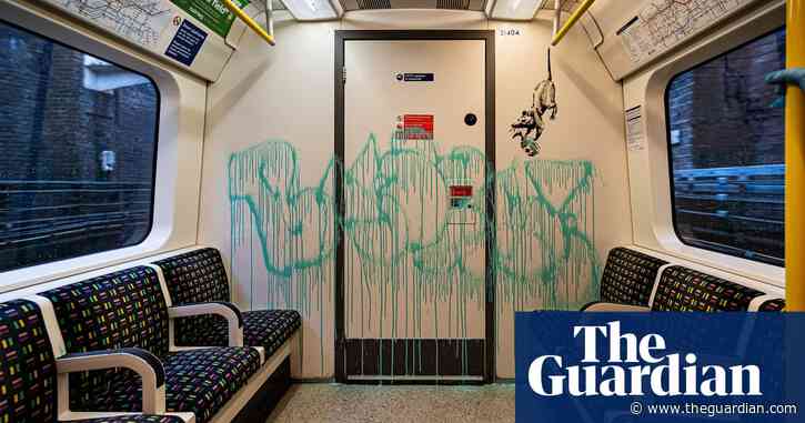 Banksy creates mask-themed work on London Underground
