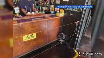 Pub in England installs electric fence around bar to encourage customers to keep their distance