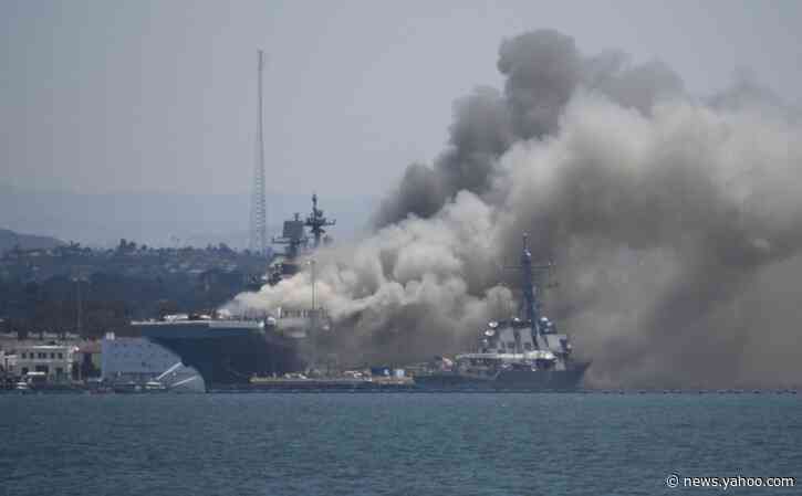 Fire ravages ship for 2nd day; sends acrid haze over city