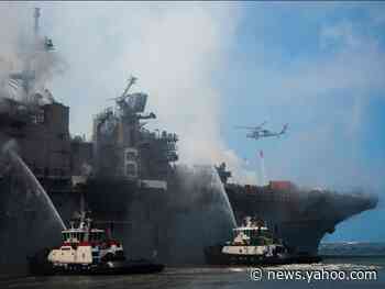 US Navy says it is 'too early to tell' if the badly burnt warship that has been on fire for days can be saved