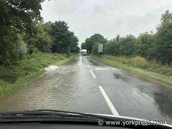 Burst water main floods York's Wigginton Road