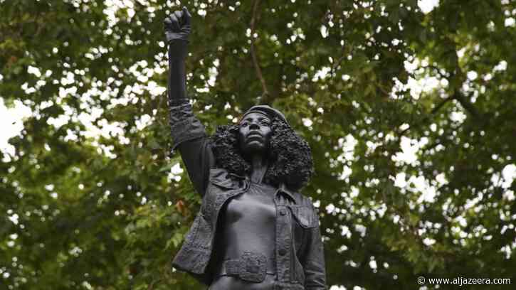 BLM protester figure replaces UK slave trader statue in Bristol - Al Jazeera English