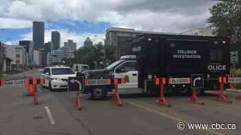 Pedestrian killed on sidewalk after SUV runs red light near downtown Edmonton
