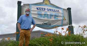 Orillia, Ont., installs large masks on entrance signs to drill home COVID-19 safety message - Globalnews.ca