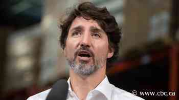 Prime Minister Justin Trudeau speaks to reporters