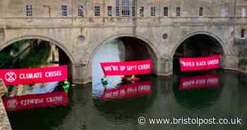 Extinction Rebellion protest underneath Bath's Pulteney Bridge