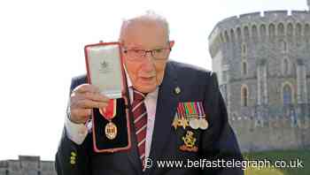 ‘Absolutely magnificent day’ as Captain Sir Tom Moore is knighted by Queen