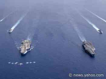 The US Navy again has 2 carrier strike groups in the South China Sea as the US and China trade jabs