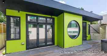 This lime green home with a hot tub is up for auction