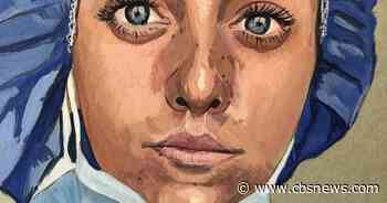 An artist wanted to thank medical workers on the frontlines. So he's painting them - CBS News