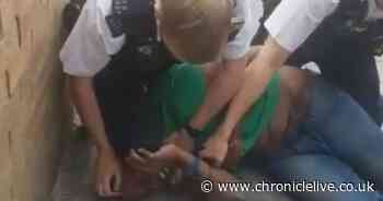 Police officer suspended for kneeling on man's neck during arrest