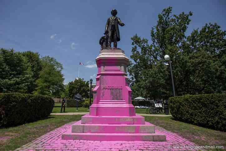 Toronto police charge three people with mischief after statues are covered in paint during Black Lives Matter protest - The Globe and Mail
