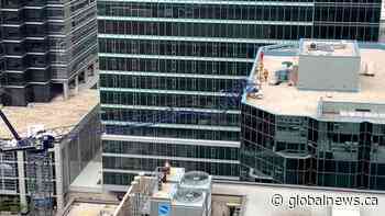 Cellphone video shows aftermath of crane collapse in downtown Toronto | Watch News Videos Online - CKNW News Talk 980