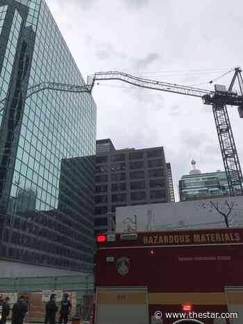 Crane hits building in Toronto, forcing evacuations and road closures - Toronto Star