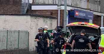 Moment armed police storm house in Port Tennant, Swansea - Wales Online