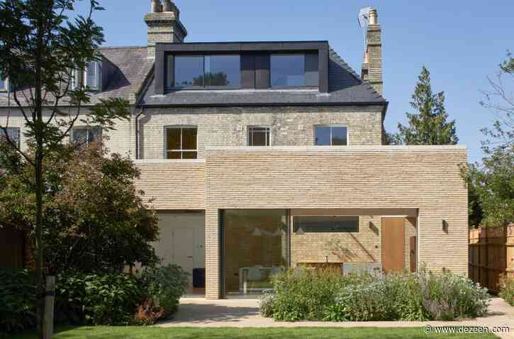 Neil Dusheiko Architects contrasts pale-brick extension with charred-wood garden sauna
