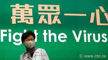 Hong Kong issues mask rules amid COVID-19 surge, Russia rejects vaccine hacking claims