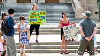 March to Unmask rallies decrying mandatory mask policies take place in Regina, Saskatoon