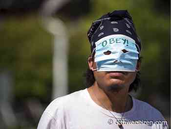 'I exempt myself:' Protesters march against mandatory masks