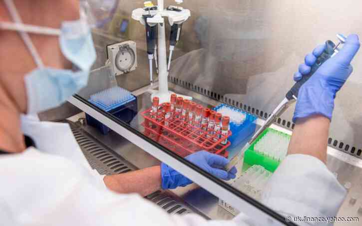 AstraZeneca shares hit record high on vaccine hopes