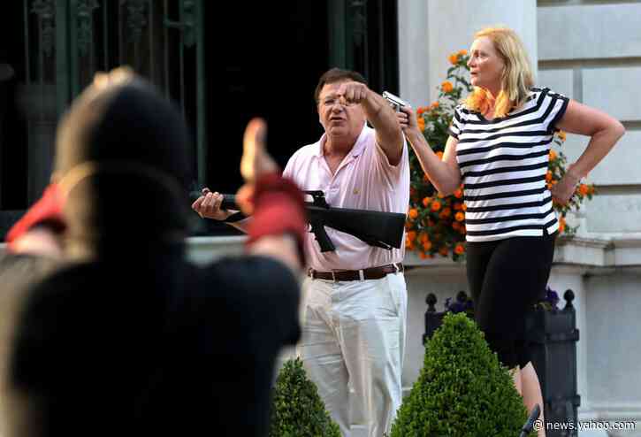 St. Louis couple charged for pulling guns at protest