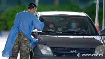 Florida COVID-19 cases soar again, California sees surge stabilize