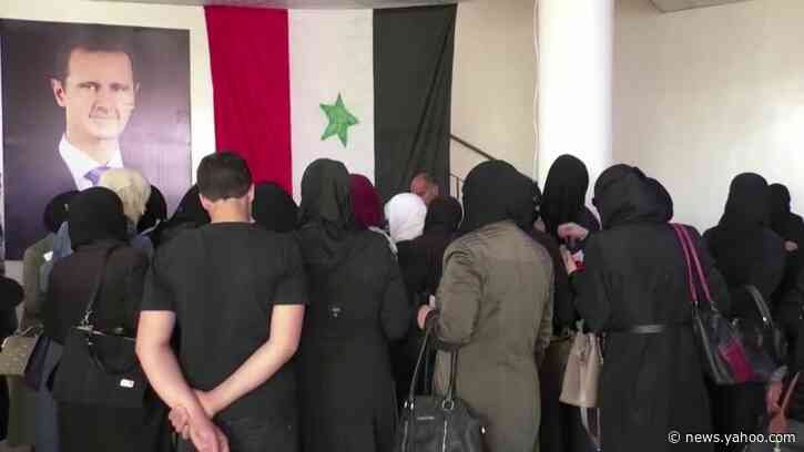 Syrians vote in 'theatrical election'