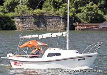 Ailing outboard shifts course of man sailing the length of the Ohio River