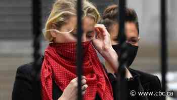 Amber Heard testifies Johnny Depp threw liquor bottles at her 'like grenades'
