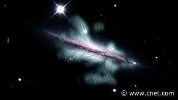 Wild image shows spiral galaxy's massive, swirly magnetic field     - CNET