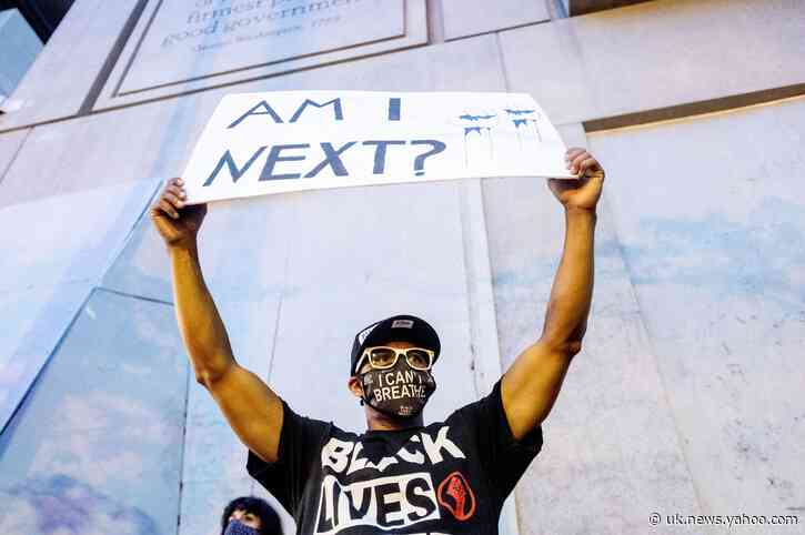 AP PHOTOS: Facing federal agents, Portland protests swell