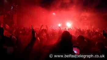 Liverpool fans gather outside Anfield to celebrate title win despite warnings