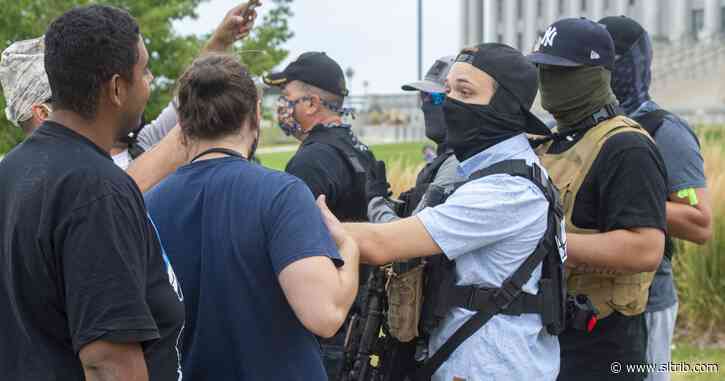 More than 20 armed men show up at Utah capitol during small demonstration against police violence