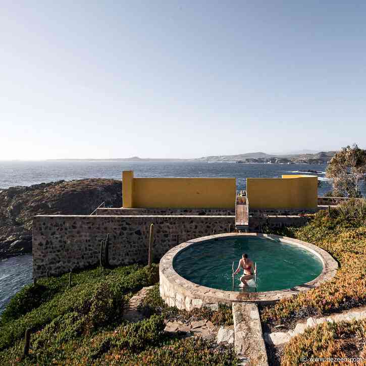 Photographs reveal curved yellow wall wrapping rooftop terrace of Los Vilos House by Cristián Boza