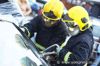 Woman rescued from car after crash in Scarborough
