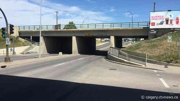 Train overpass damaged by transport truck in Lethbridge hit-and-run