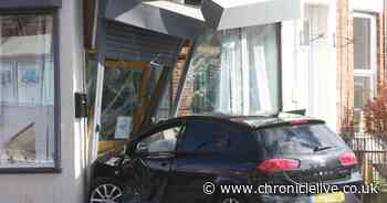 'You don't see this everyday': Shock as car smashes through shop window