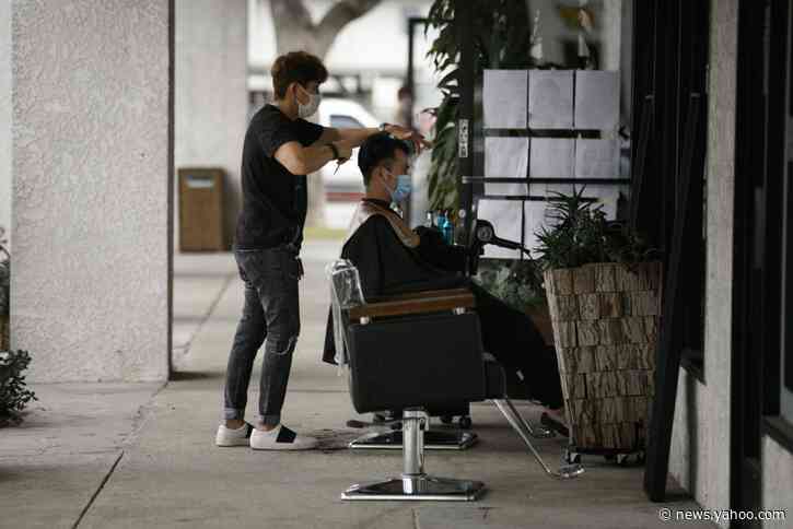 Virus surge interrupts hopes for a swift economic recovery