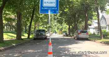 Yard signs encourage drivers to slow down in Minneapolis and St. Paul