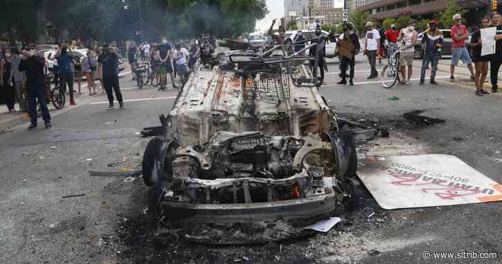 Third man federally charged with arson for allegedly lighting police car on fire during protests